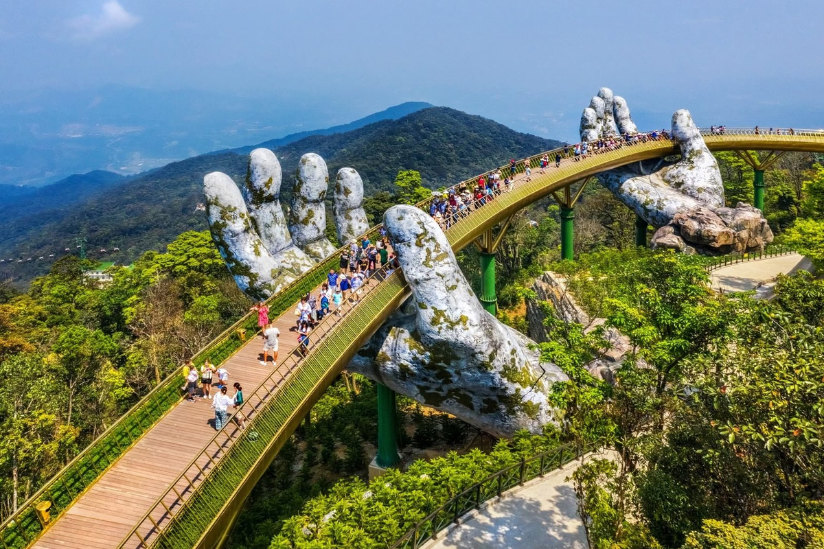 The Golden Bridge at Ba Na Hills, Da Nang, held up by two giant stone hands
