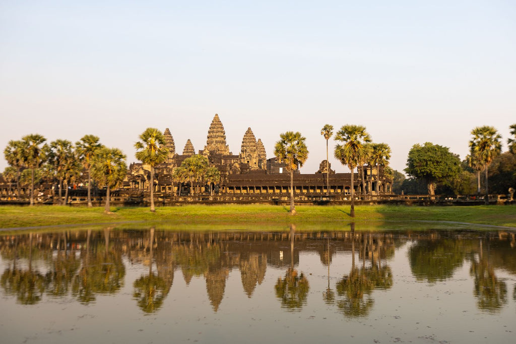 Angkor Wat reflected in the water in daylight