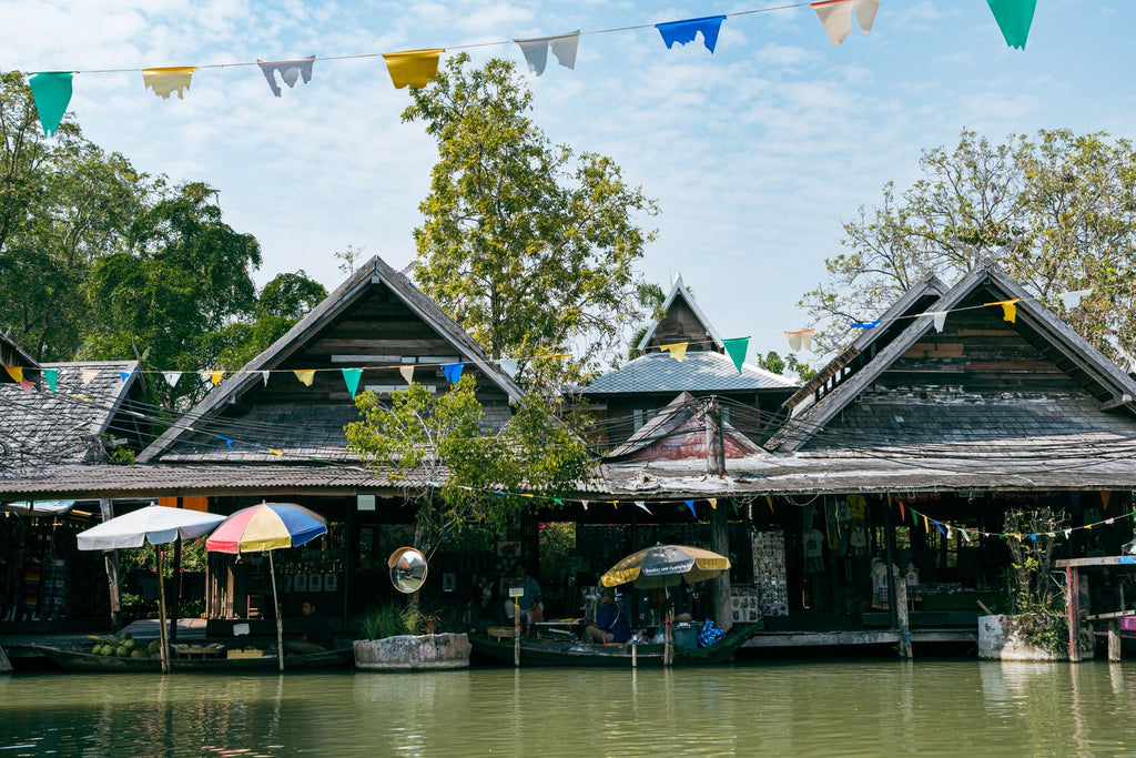 Floating market with boats and umbrellas