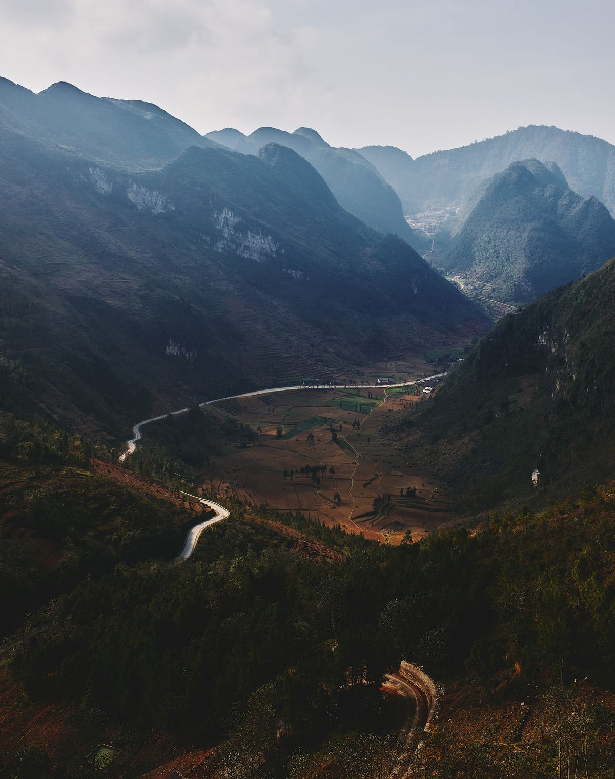 Winding roads and mountains in Ha Giang, aerial