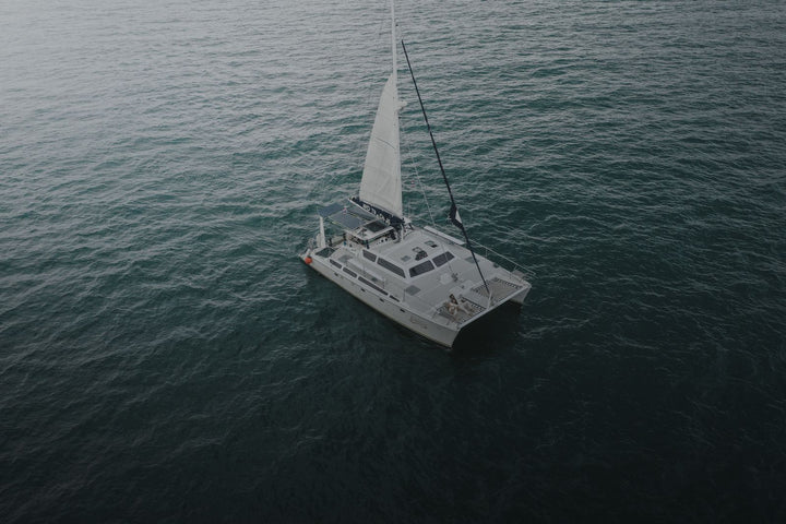 Sailing boat in the blue water off Phuket