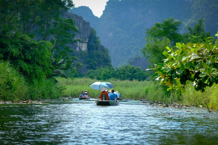 Boat ride through the waters of Ninh Binh