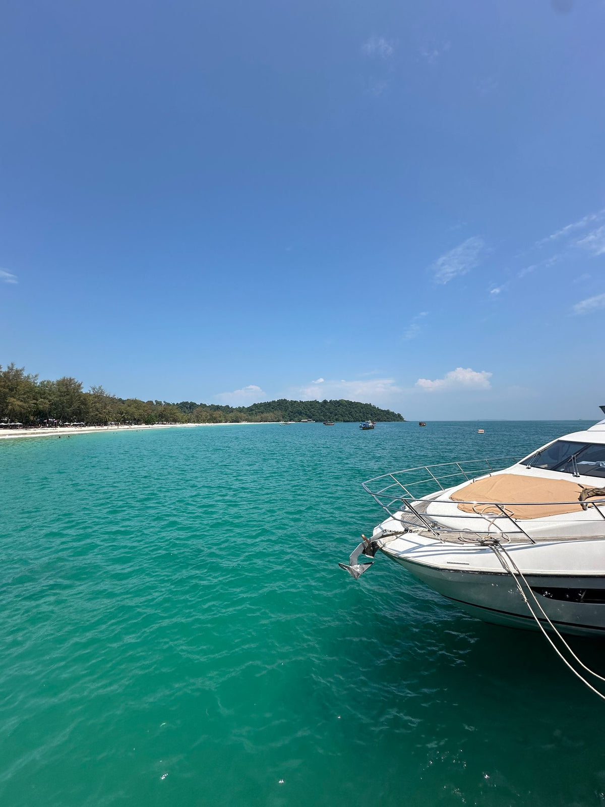 Yacht on clear tropical water